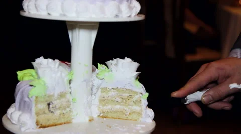 The couple cut the wedding cake Stock Footage 61693309