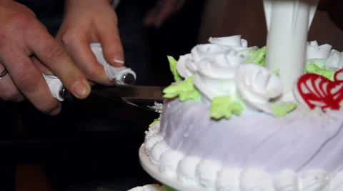 The couple cut the wedding cake Stock Footage 61693596