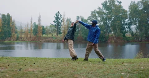 Couple, dance and happy date in countryside, park or camping in nature or forest Stock Footage 246738938