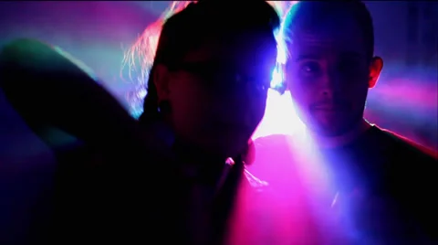 A Couple Dance in Extreme Lighting at a party Video stock 33832902