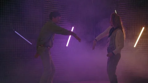 Couple dancing in the 80s disco with retro outfit performance Stock Footage 239624611