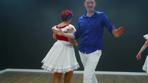 Couple dancing bachata together in studio Stock Footage 337216656