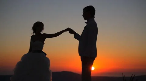 Couple dancing on a background of a sunset Stock Footage 56249651