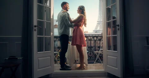 Couple Dancing on Balcony in Paris Stock Footage 296172475