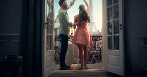 Couple Dancing on Balcony in Paris Stock Footage 296172557