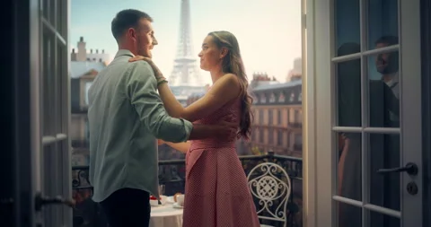 Couple Dancing on Balcony in Paris Stock Footage 296172592