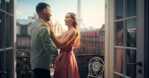 Couple Dancing on Balcony in Paris Stock Footage 296172628