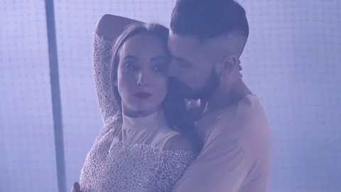 Couple dancing behind the net Stock-Footage 143586824