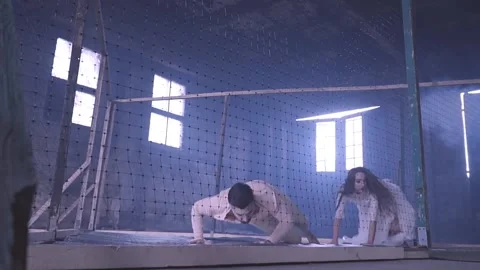 Couple dancing behind the net Stock Footage 147540252