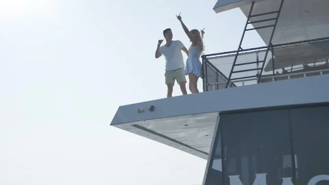 Couple Dancing on a Boat Corner Stock Footage 87974259