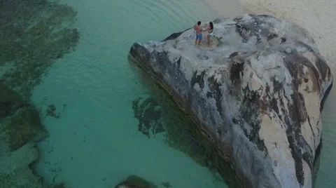Couple dancing on boulder Stock Footage 67615052