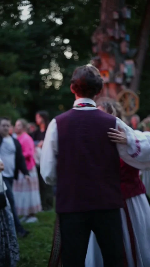 Couple dancing during Jonines celebration Stock Footage 322070512