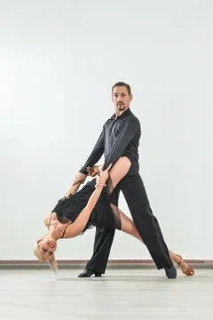 Couple dancing isolated over white background Fotos Stock