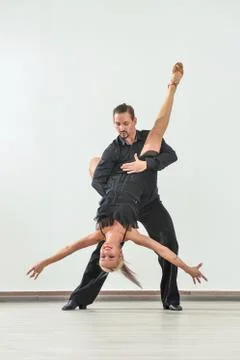 Couple dancing isolated over white background Fotos Stock