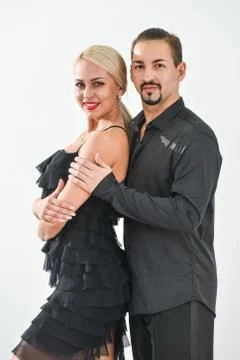 Couple dancing isolated over white background Fotos Stock