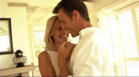 Couple dancing in kitchen Stock Footage 43684743