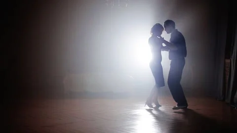 Couple dancing salsa in the fog Stock Footage 88167484