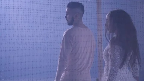 Couple dancing in a smoky room Stock-Footage 148476151