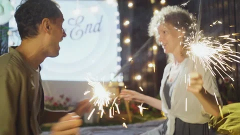 Couple dancing with sparklers in hands Stock Footage 260335361
