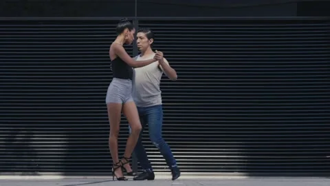 Couple dancing Tango argentino in the streets of Buenos Aires Argentina Stock Footage 170154586