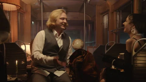 A couple on a date in an old tram dancing 스톡 동영상 259178086
