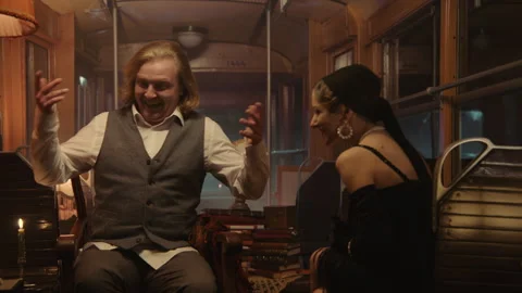 A couple on a date in an old tram dancing Stock-Footage 259576342