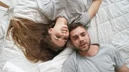 Couple Daydreaming In Bed Stock Footage