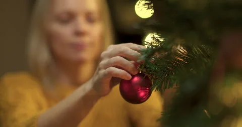 Couple decorating christmas tree Stock Footage 143789271