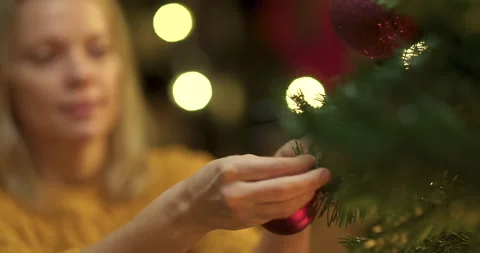 Couple decorating christmas tree Stock Footage 143789275