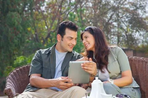 Couple with a digital tablet Stock Photos