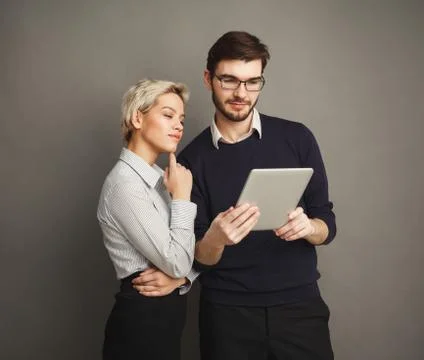Couple with digital tablet Stock Photos
