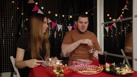 Couple Dining Together at Festive Table, teenagers at birthday party, frien.. Stock Footage 290099813