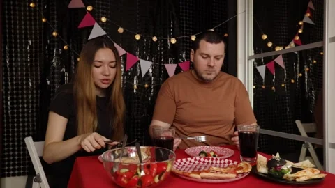 Couple Dining Together at Festive Table, family gathering for holiday celeb.. Stock Footage 292621381