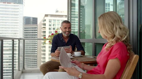 Couple discussing at balcony. Stock Footage 64119896