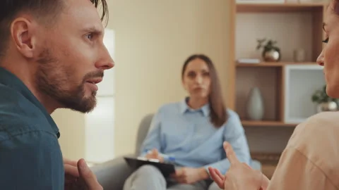 Couple discussing issues in therapy Stock Footage 306132012
