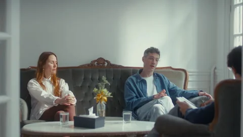 Couple Discussing Marital Problems during Family Therapy Session Stockbeeldmateriaal 346985937