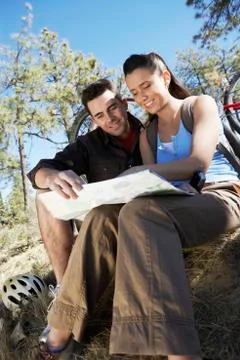 Couple In Discussion Over Roadmap Stock Photos