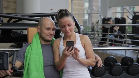 The couple does posts with selfies in the social network while standing in the Stock Footage 84452093