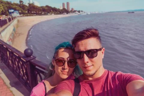 Couple doing self-portrait Stock Photos