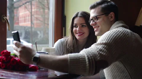Couple doing selfie in the restaurant Stock-Footage 48753142