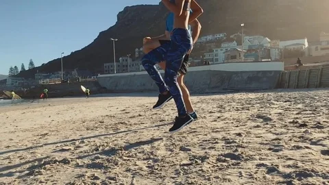 Couple doing speedwork exercise on beach slow motion Video stock 76522046
