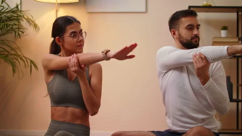 Couple Doing Stretching Exercise Stay Home Quarantine Workout Concept Stock Footage 145227927