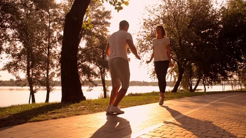 Couple doing workout in city park Stock Footage 127862150