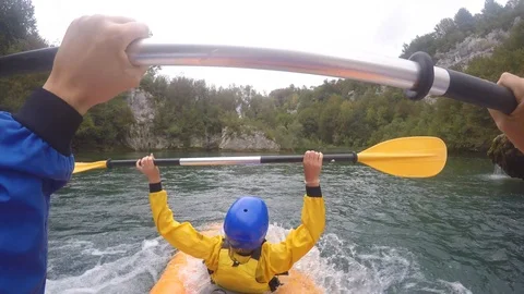 Couple in double kayak falling down waterfall 스톡 동영상 93007787