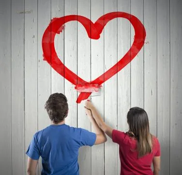 Couple drawing a heart Stock Photos