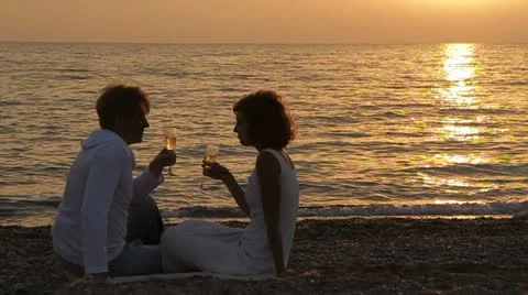 Couple Drinking Champagne On Beach Stock-Footage 22420071
