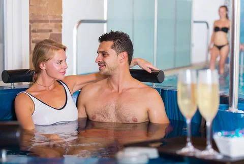 Couple is drinking champagne while resting Stock-Fotos
