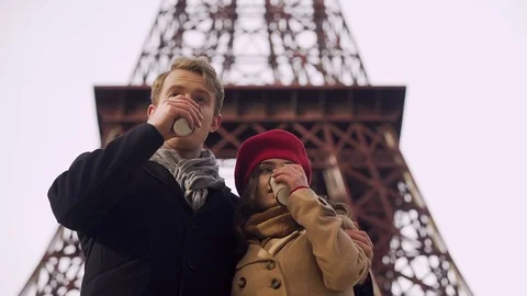 Couple drinking hot beverage getting warm and enjoying beautiful view of sights Stock Footage 83903702