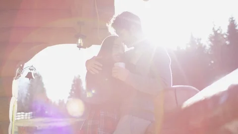 Couple drinking from mugs Stock Footage 86623231