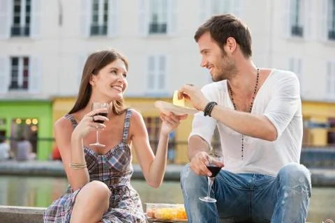 Couple drinking red wine, Paris, Ile-de-France, France Stock Photos